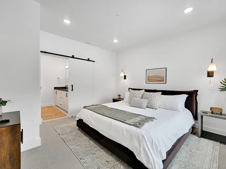 Master Bedroom with king sized bed and private bathroom
