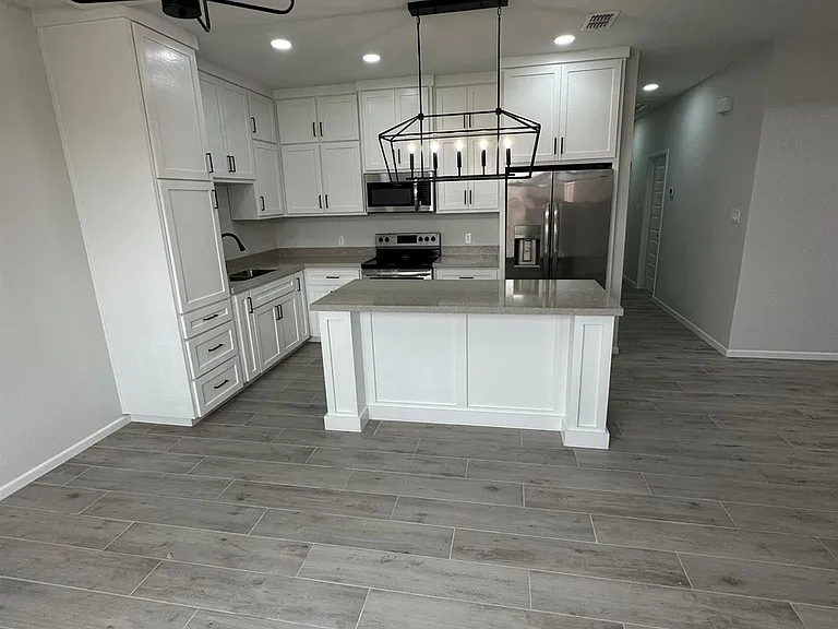 1409 S Xanthia St — Photo 4