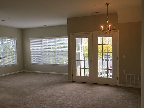 Living Room, Dining Area & Balcony