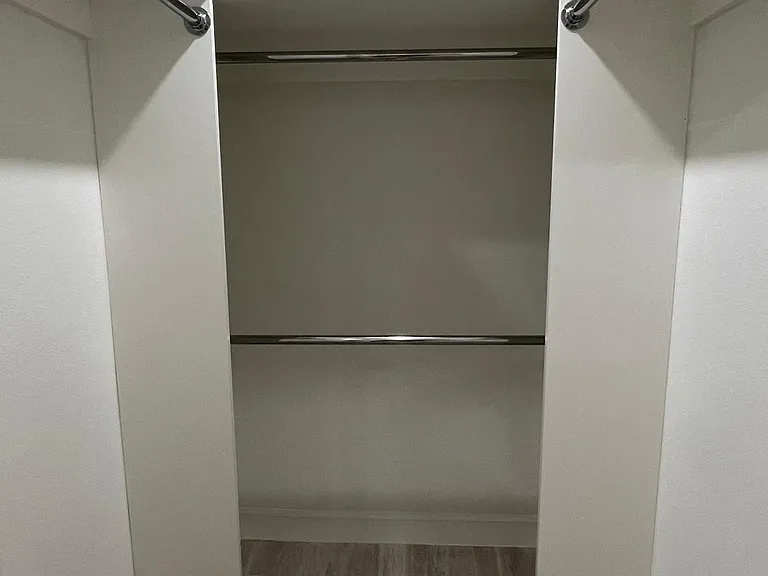 Master Bedroom Walk-In Closet with Bi-Fold door