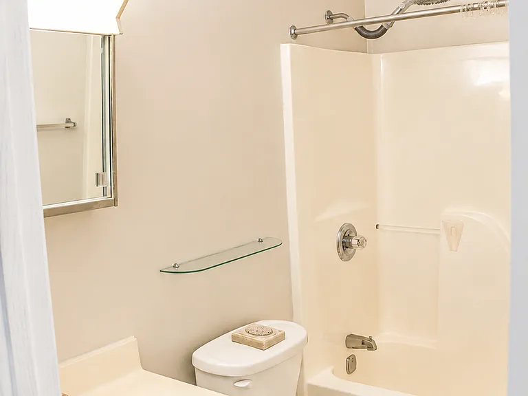 full bathroom upstairs serving the other 2 bedrooms