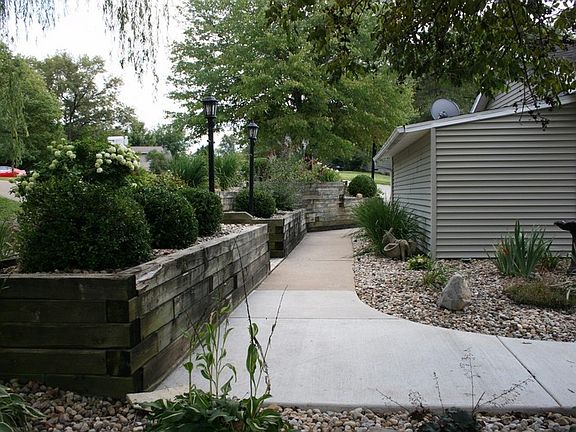 Walkway around house to garage