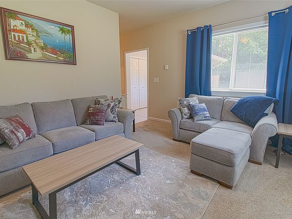 Another view of the family room that shows the entry way.