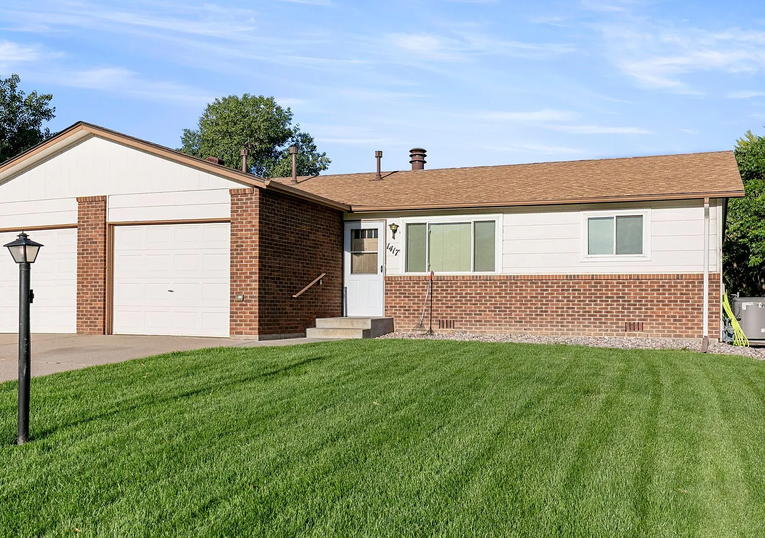 2-Bedroom Townhome with Garage and Owner-Provided Lawn Care — Photo 1