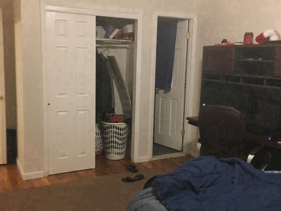 master bedroom with half bath