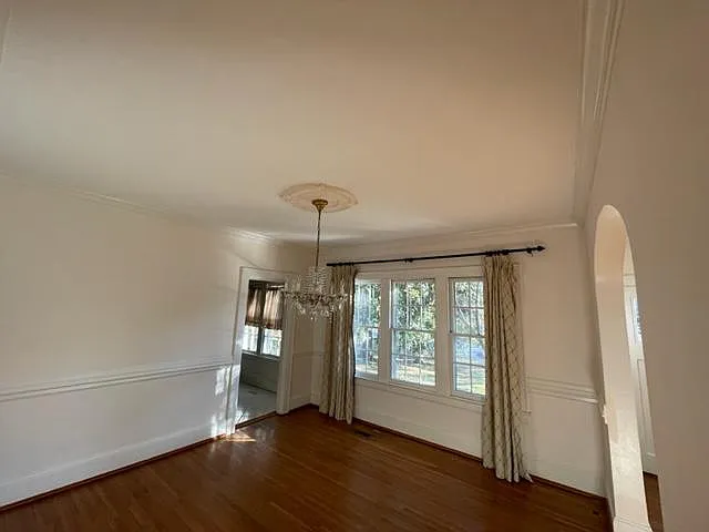 Diing room connects to the butler's pantry with more cabinets and storage/breakfast spot.