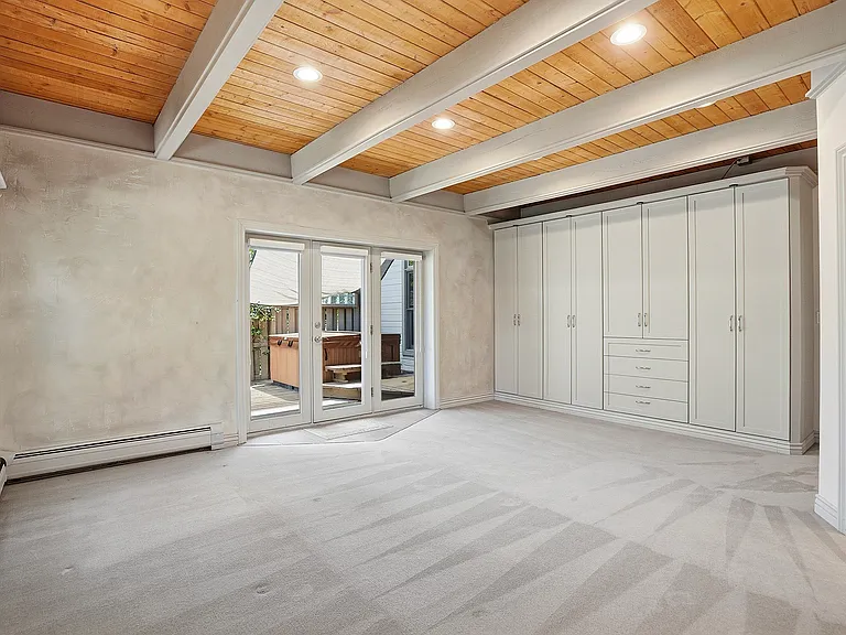 With direct access from the primary suite to the hot tub area, everyday living feels a little more like a private resort.