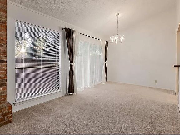 Dining Area & Sliding Door to Back Patio