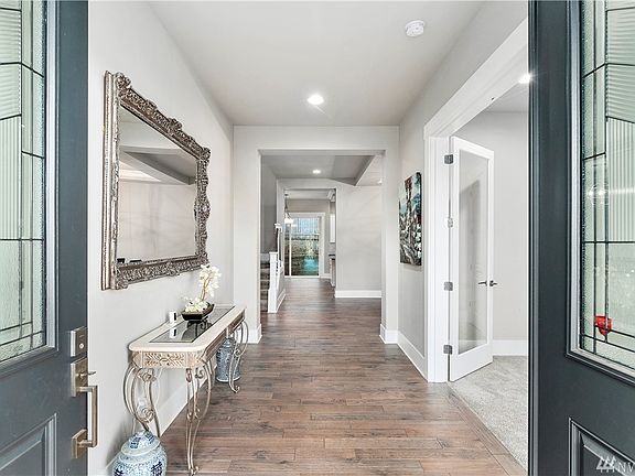 Open concept floor plan creates seamless flow throughout the home.