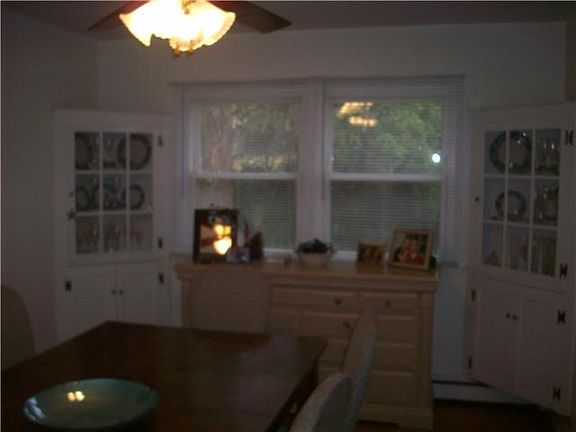 Dining Room With Built-In Corner Cabinets