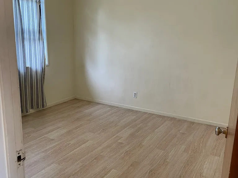 Sunny Bedroom 3 with Closet, Double-Paned Windows and Laminate Flooring