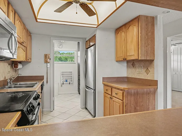2135 N Courtenay Pkwy #241 — Photo 13