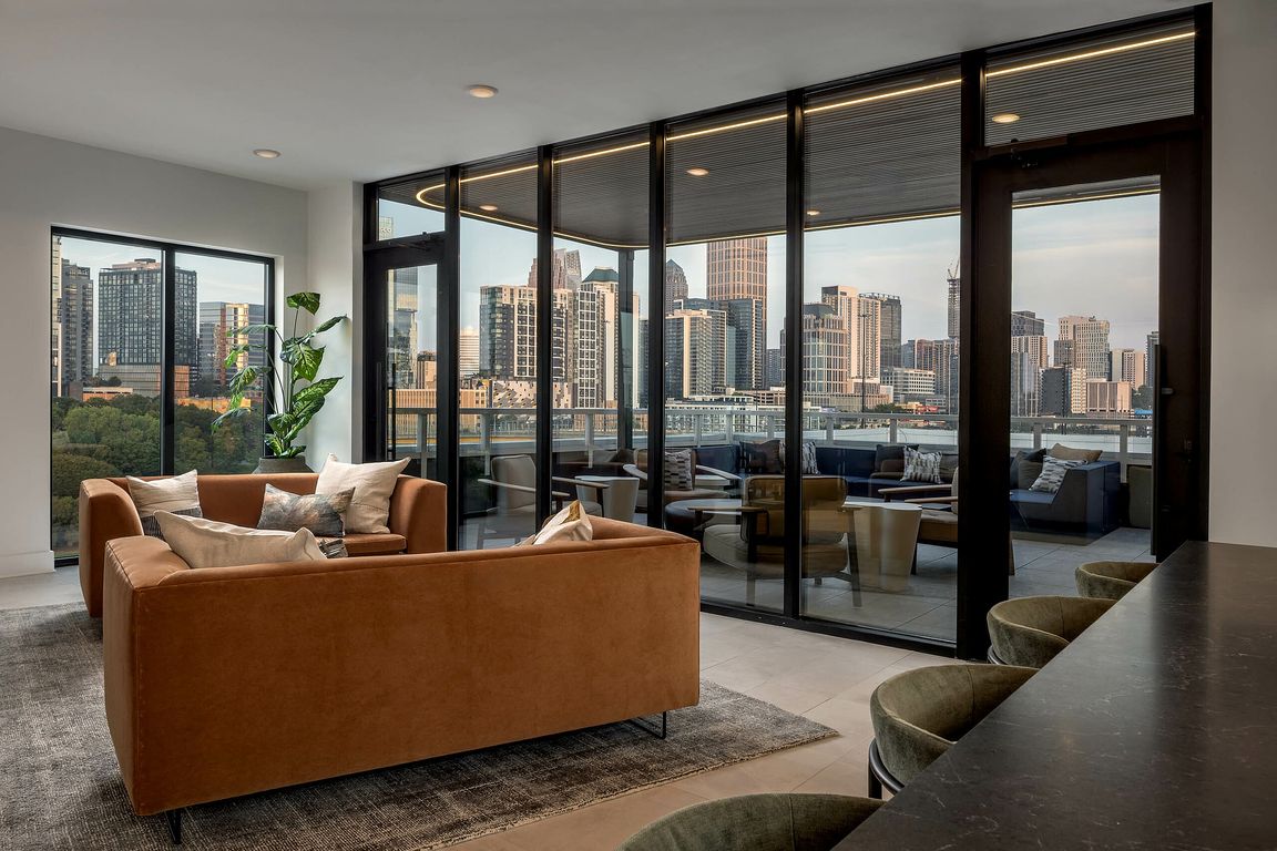 Rooftop lounge and patio with city skyline views