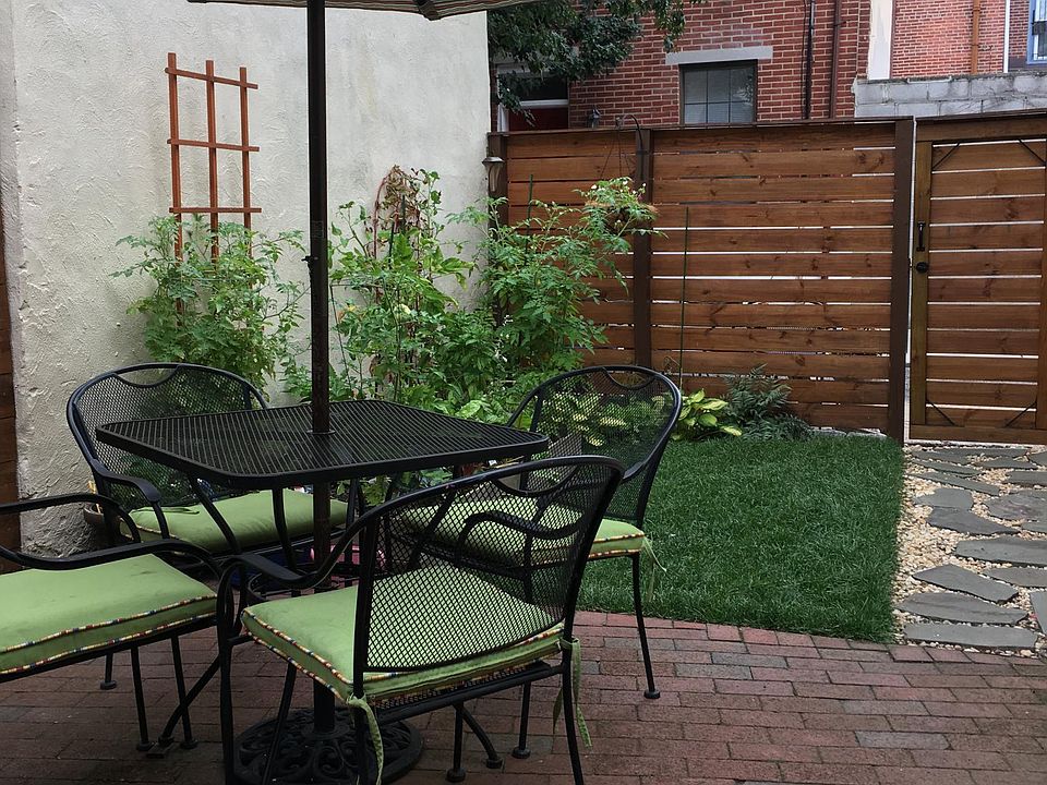 Rear private garden with access to alley