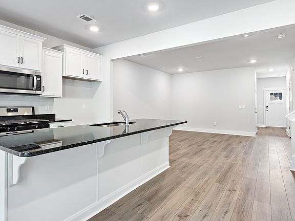 Kitchen with island in a DRB Homes Litchfield home in the Tyger Ridge Community