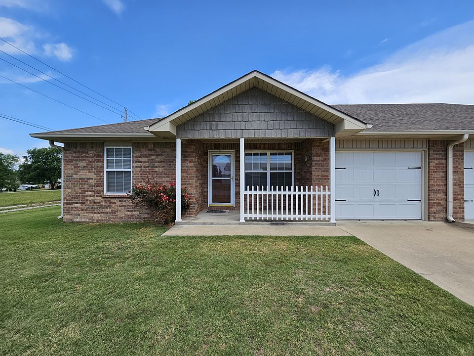 Large front yard, garage and driveway