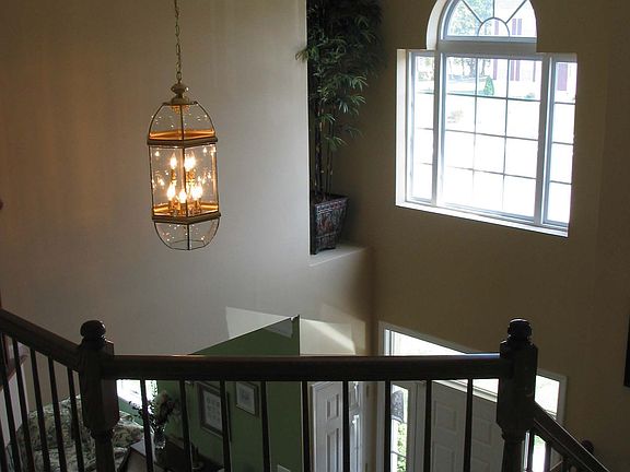 2 Story Foyer with Side Stairs
