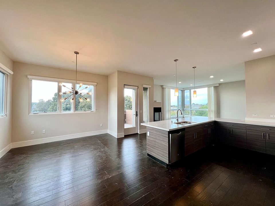 Entrance into Open Living, Dining & Kitchen Space