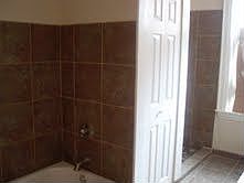 Bath tub and tiled shower