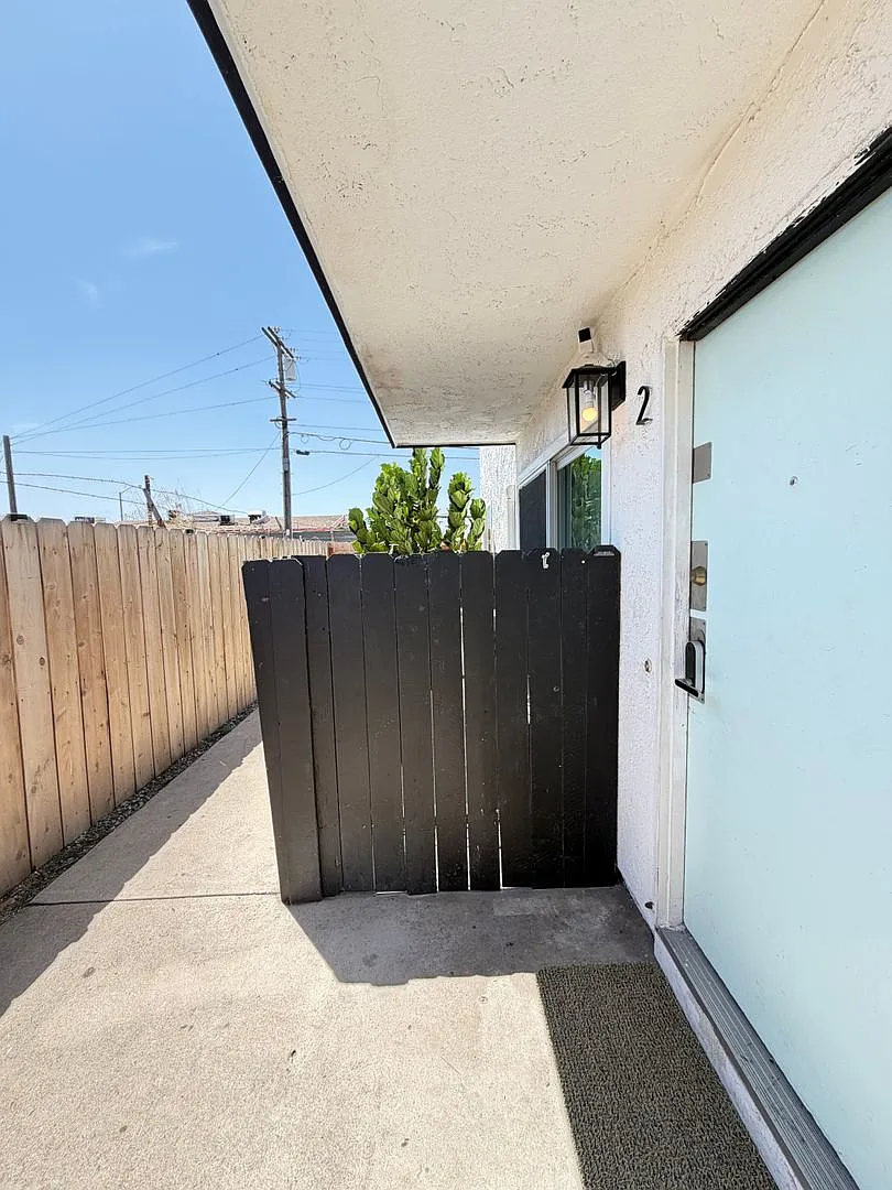 Fantastic & Modern Corner Unit w/ Private Patio — Photo 1