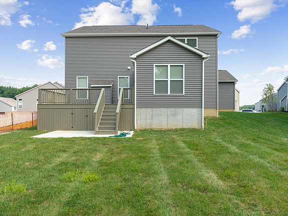 19' x 13'5 deck with storage below.