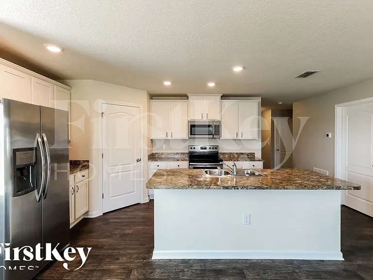 6919 Sandle Dr — Photo 7