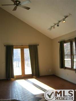 greatroom w/ decorative tile floor