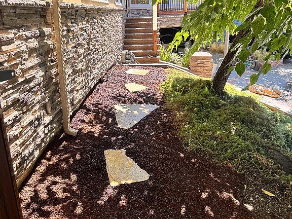 Pathway from side gate master bedroom faces stair case
