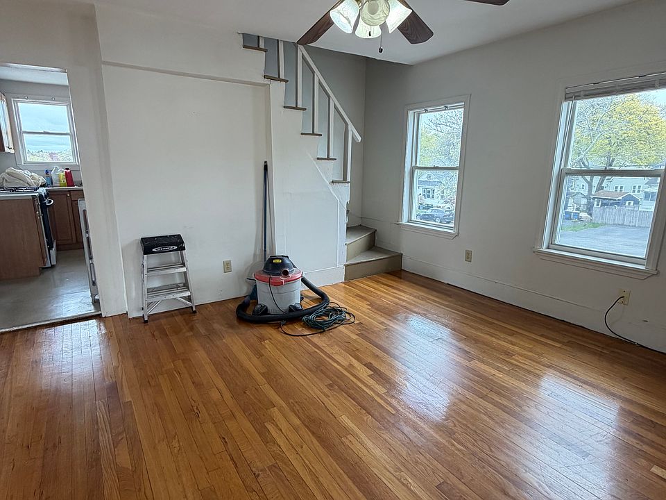 Nice sized living room offering plenty of sunlight and newly finished hardwood flooring.