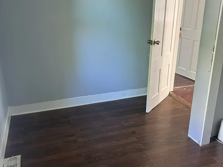 Bedroom #3 with new floors.