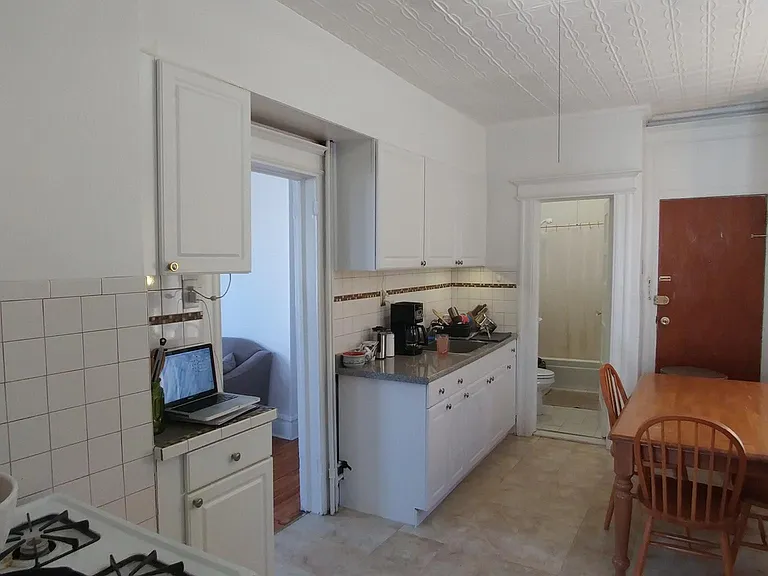 high vintage tin ceiling in kitchen