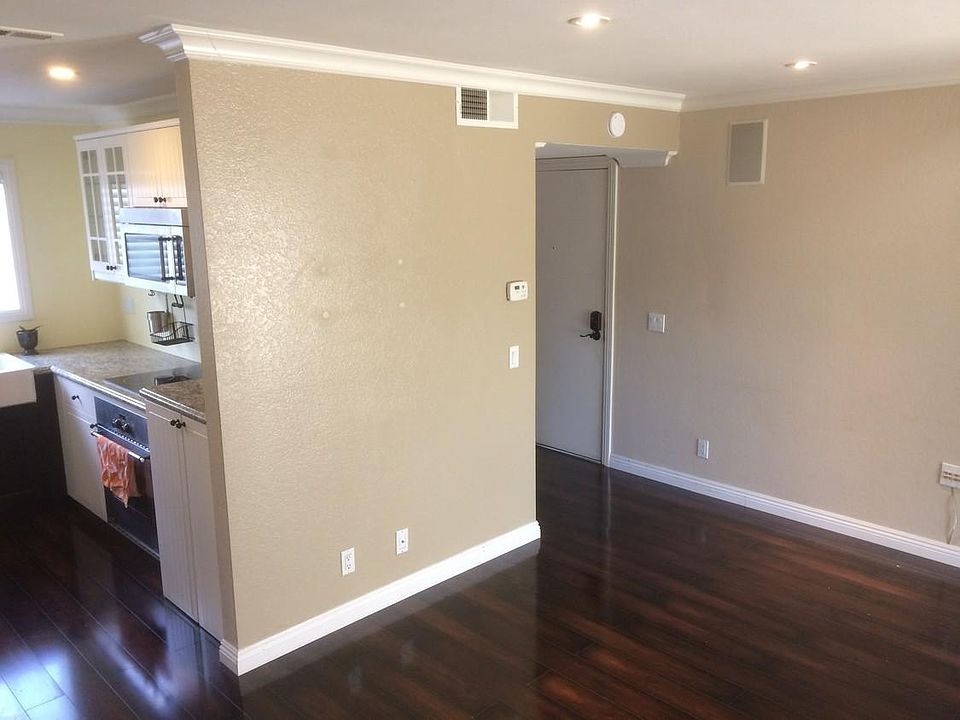 Living room looking into kitchen