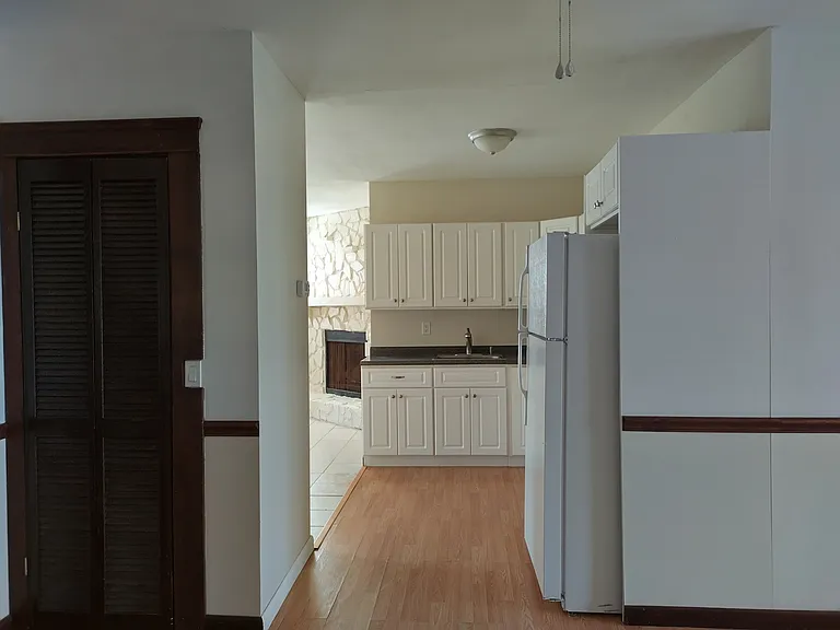 Looking from the main living area to the kitchen and dining room.