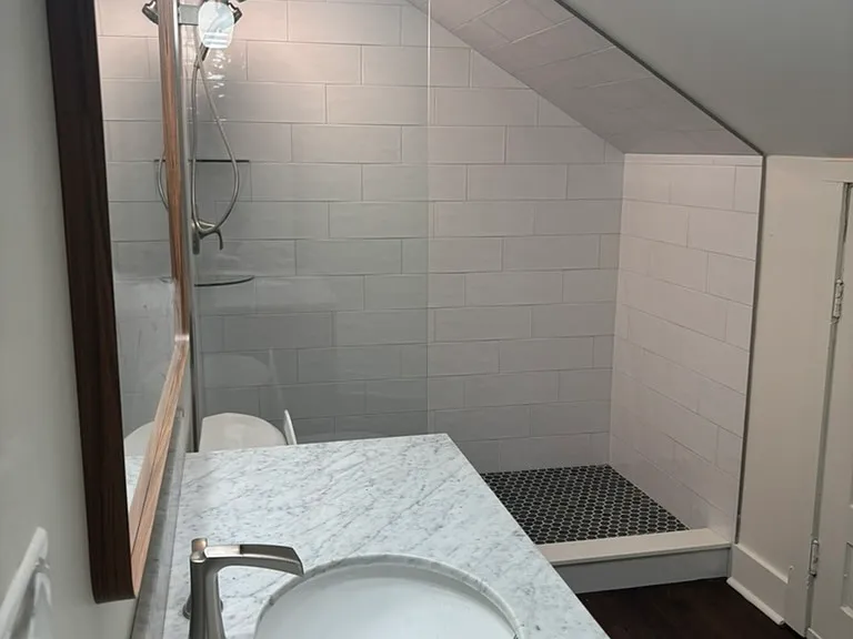 Large bathroom with quartz vanity