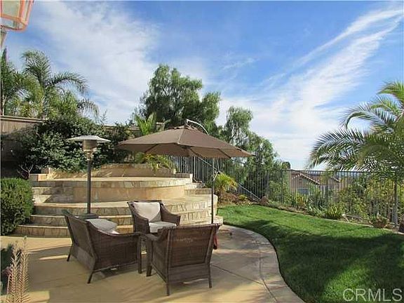 Back yard with elevated patio for optimal ocean view