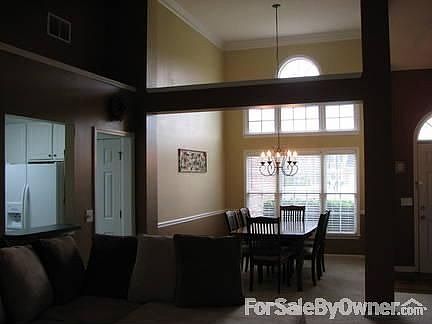 Step into Living and Formal Dining Rooms
						:
						Invited with cathedral ceilings and access to your Living, Dining and Kitchen.