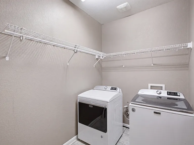 Laundry room with washer and dryer
