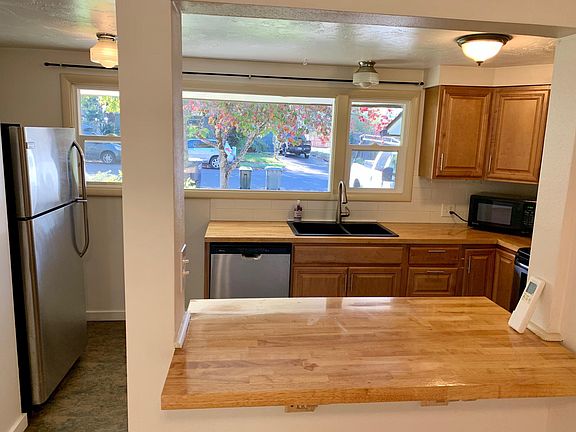 Kitchen with pass-thru bar, perfect for stools.
