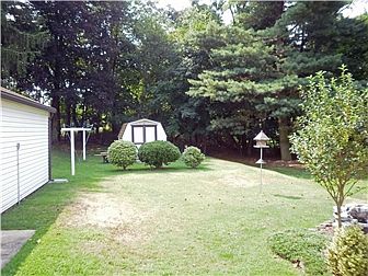 Shed and Tree lined rear yard