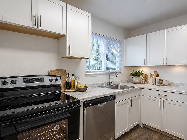 Modern L-shaped kitchen with natural light