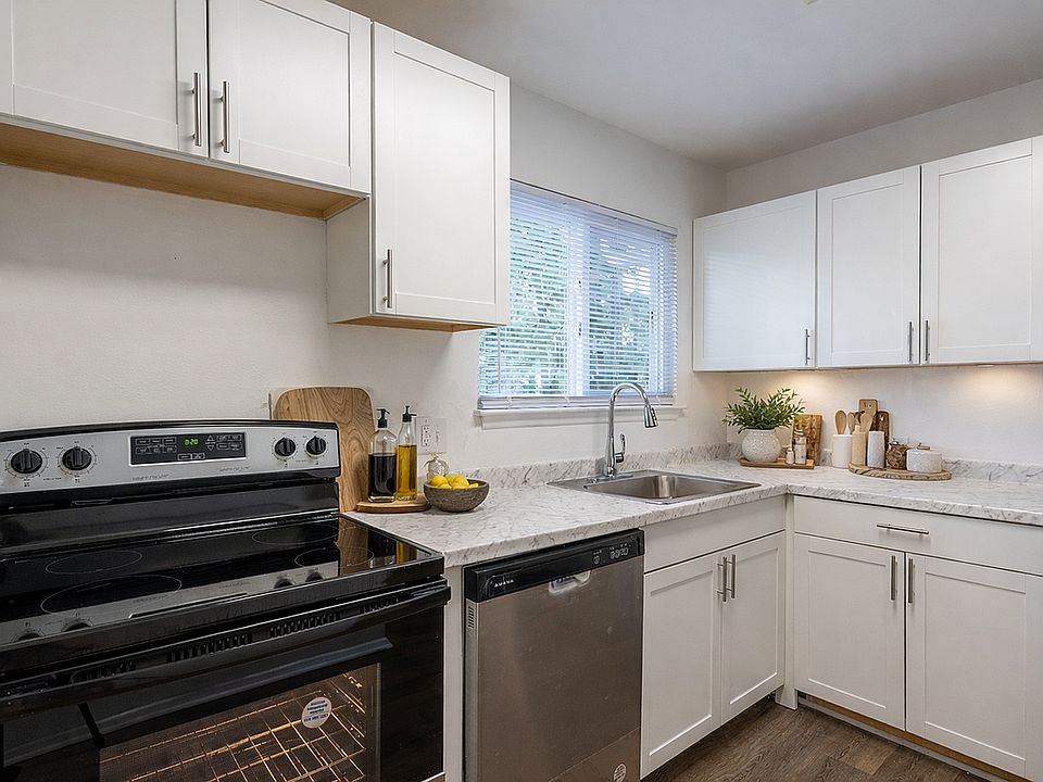 Modern L-shaped kitchen with natural light