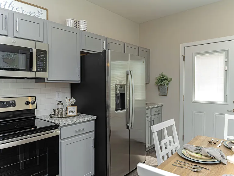 Kitchen with granite counters and stainless appliances