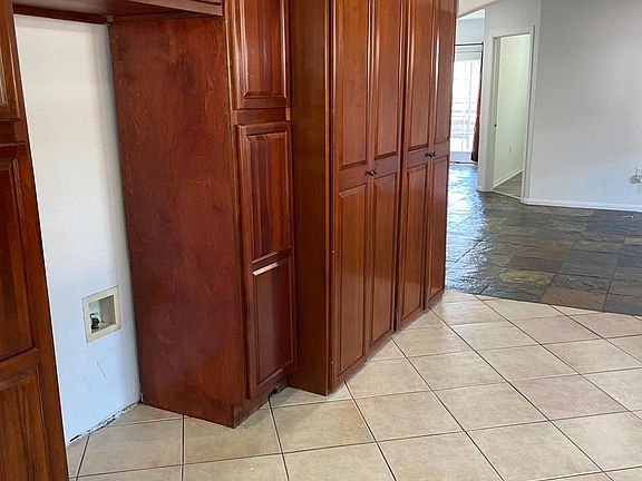 Kitchen cabinets and laundry area