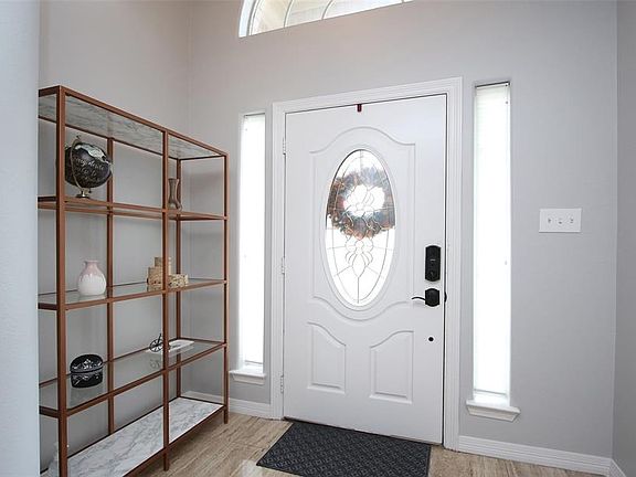 Looking back at the entry way you can see the transom window and how bright the foyer is from the natural lighting.