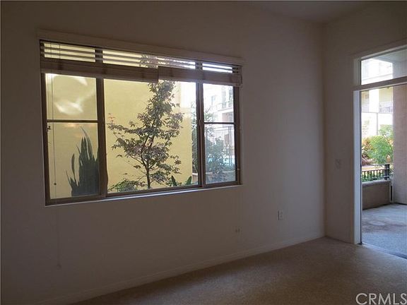 Picturesque Window and French Door Leading to Private Patio