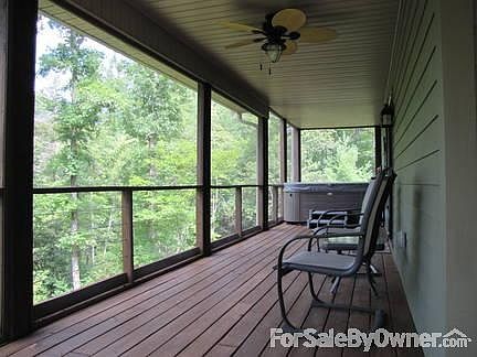 Back screened porch with hot tub