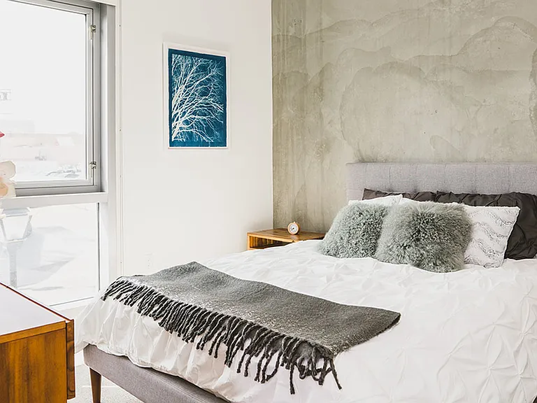 A touch of modern industrial with concrete walls