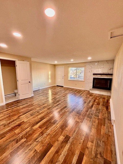 Main floor living room with half bath