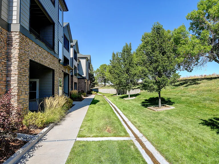 Well-maintained landscaping and lawns around Michael Place Apartments