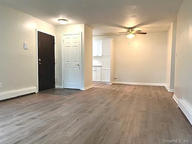 LEFT IS DOOR TO APT., WITH LARGE COAT CLOSET- LIVING SPACE